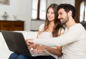 a couple watching virtual showings