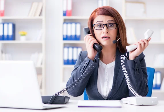 a photo of a property manager needing a virtual answering service